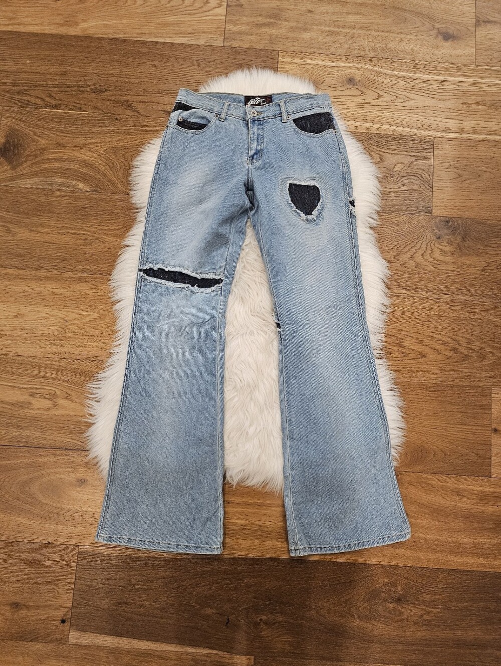 Vintage Low Rise Lazer blue jeans with black lace patches
